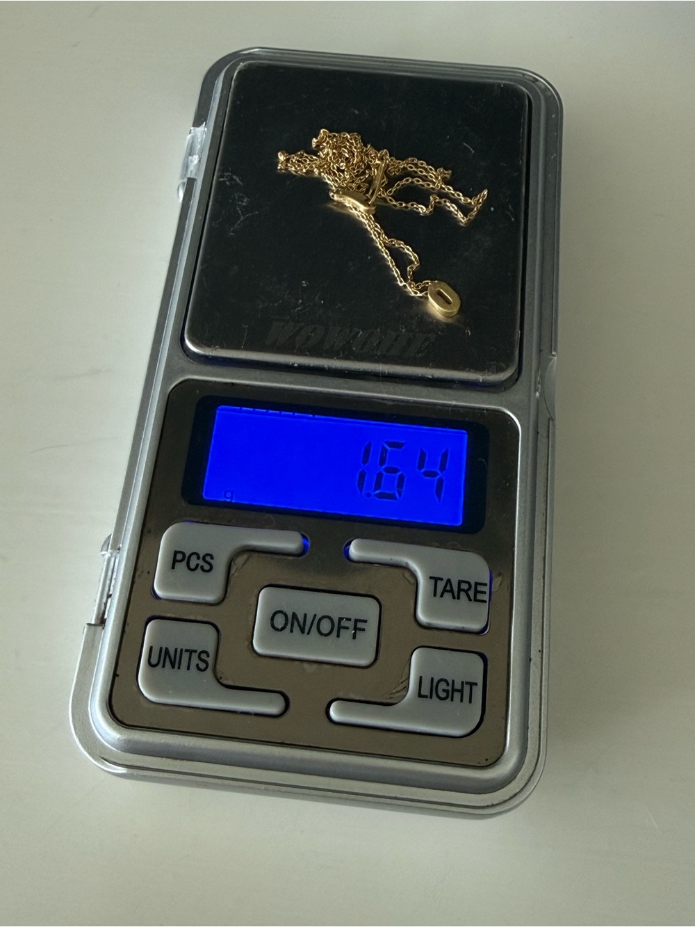 Marian Maurer ‘O’ 18k gold micro initial pendant necklace. - Picture 8 of 8